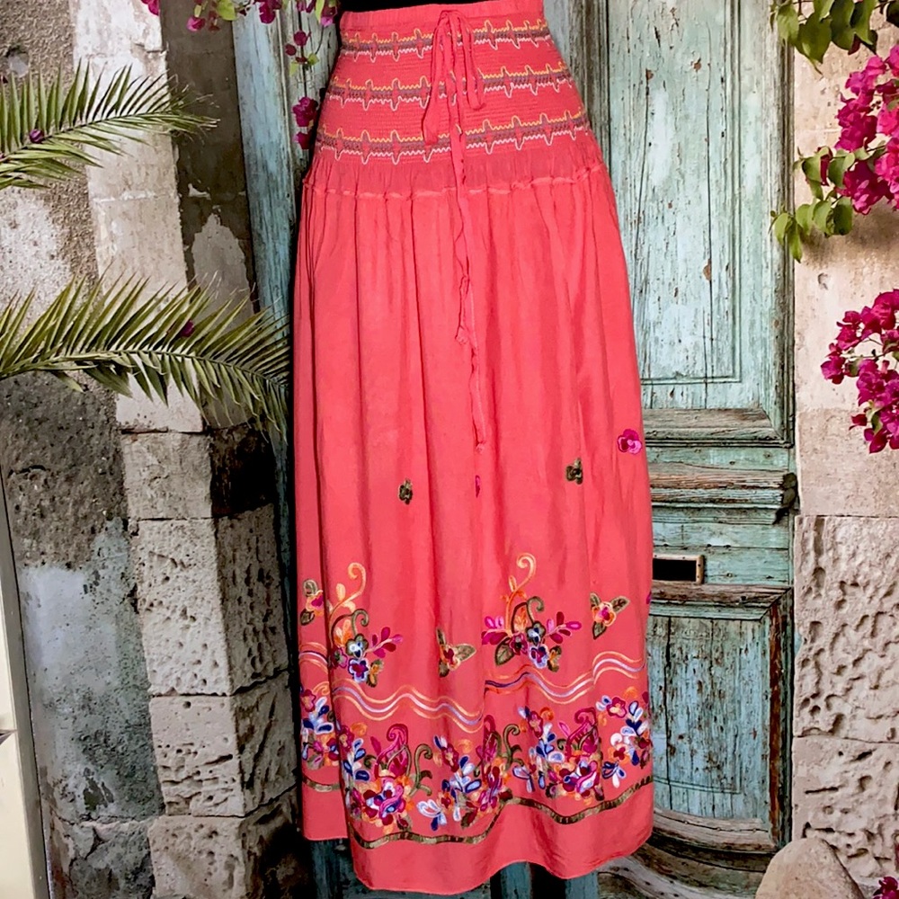 NWOT
beautiful skirt with hand-embroidered flowers